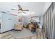 Relaxing sitting area with barrel table and comfy armchairs at 5240 Se 17Th St, Ocala, FL 34471