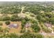 Aerial view showing home's location in a quiet neighborhood at 5240 Se 17Th St, Ocala, FL 34471