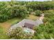 An aerial view shows the home's private backyard with a pool at 5240 Se 17Th St, Ocala, FL 34471
