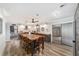 Modern kitchen with a large island, wood countertops, and stainless steel appliances at 5240 Se 17Th St, Ocala, FL 34471