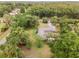 House with pool and large lot surrounded by trees at 5240 Se 17Th St, Ocala, FL 34471