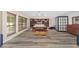 Spacious main bedroom with built-in shelving and fireplace at 5240 Se 17Th St, Ocala, FL 34471