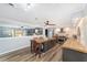 Spacious kitchen with an island, updated cabinets and wood countertops at 5240 Se 17Th St, Ocala, FL 34471