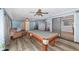 Pool table is the centerpiece of this game room with wood-look flooring at 5240 Se 17Th St, Ocala, FL 34471