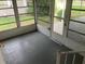 Bright sunroom with plenty of windows and access to outdoors at 24822 Pine Hl, Leesburg, FL 34748