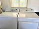 Neat laundry room with washer and dryer at 10765 Sw 62Nd Ter, Ocala, FL 34476