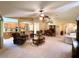 Open concept living room with views to the kitchen and dining areas at 16026 Sw 14Th Avenue Rd, Ocala, FL 34473