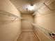 Large walk-in closet with wire shelving at 16026 Sw 14Th Avenue Rd, Ocala, FL 34473