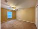 Spacious bedroom with ceiling fan and window at 16026 Sw 14Th Avenue Rd, Ocala, FL 34473