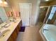 Spacious bathroom with double sinks, shower, and garden tub at 16026 Sw 14Th Avenue Rd, Ocala, FL 34473