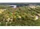 Aerial view of a wooded lot with lake access at 15669 Se 112Th Ln, Ocklawaha, FL 32179