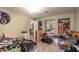 Bedroom with a bed and multiple storage items at 15669 Se 112Th Ln, Ocklawaha, FL 32179