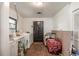 Laundry room with washer, dryer, and exterior access at 15669 Se 112Th Ln, Ocklawaha, FL 32179