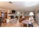 Living room with stone fireplace and sectional sofa at 15669 Se 112Th Ln, Ocklawaha, FL 32179