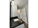 Single vanity with dark countertop and modern fixtures at Tbd Fisher Lane Trce, Ocklawaha, FL 32179