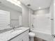 Simple bathroom with a tub shower combo and granite countertop at 13359 Sw 80Th St, Dunnellon, FL 34432