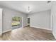 Bright dining area with sliding glass doors leading to the backyard at 13359 Sw 80Th St, Dunnellon, FL 34432