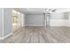 Living room with sliding glass doors leading to a patio at 10020 Sw 202Nd Cir, Dunnellon, FL 34431