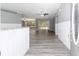 Bright entryway with white wainscoting and grey walls at 10020 Sw 202Nd Cir, Dunnellon, FL 34431