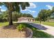 Single-Gathering home with driveway and landscaping at 10020 Sw 202Nd Cir, Dunnellon, FL 34431