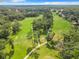 Aerial view of a lush green golf course at 10020 Sw 202Nd Cir, Dunnellon, FL 34431