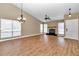 Bright living room with hardwood floors, fireplace, and lots of natural light at 2309 Se 19Th Cir, Ocala, FL 34471