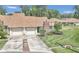 Front view of the house and driveway, showing landscaping at 2309 Se 19Th Cir, Ocala, FL 34471