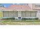 View of the back of the house showing the screened porch at 2309 Se 19Th Cir, Ocala, FL 34471