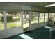 Sunroom with view of backyard and surrounding landscape at 2309 Se 19Th Cir, Ocala, FL 34471