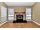 Fireplace with a rustic mantel in a living room setting at 2309 Se 19Th Cir, Ocala, FL 34471