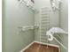 Bright walk-in closet with wire shelving and hanging rods at 2309 Se 19Th Cir, Ocala, FL 34471