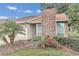 Well-maintained house with brick chimney and landscaped front yard at 2309 Se 19Th Cir, Ocala, FL 34471