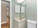 Small bathroom with toilet and vanity at 2309 Se 19Th Cir, Ocala, FL 34471