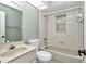 Clean bathroom with tub, toilet, and vanity at 2309 Se 19Th Cir, Ocala, FL 34471