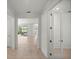 Bright hallway with view into living and kitchen areas at 10145 Sw 89Th Loop, Ocala, FL 34481