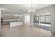 Open concept dining area with sliding glass doors leading to a patio at 10145 Sw 89Th Loop, Ocala, FL 34481