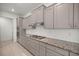 Sleek kitchen with granite countertops and stainless steel appliances at 10145 Sw 89Th Loop, Ocala, FL 34481