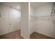 Bright walk-in closet with double rods and access to another room at 10145 Sw 89Th Loop, Ocala, FL 34481
