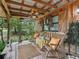 Rustic porch with rocking chairs and a ceiling fan at 4344 Cr 542H, Bushnell, FL 33513