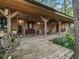 Spacious front porch with rocking chairs and country decor at 4344 Cr 542H, Bushnell, FL 33513