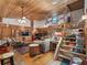 Open living space with vaulted wood ceilings, hardwood floors, and a rustic feel at 4344 Cr 542H, Bushnell, FL 33513
