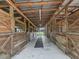 Interior view of barn with multiple stalls at 4344 Cr 542H, Bushnell, FL 33513