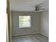 Bright bedroom with tile flooring and a ceiling fan at 3817 Sw 161St Loop, Ocala, FL 34473