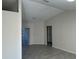 Open living room with tile floors and access to other rooms at 3817 Sw 161St Loop, Ocala, FL 34473
