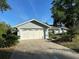 Single car garage with driveway at 3817 Sw 161St Loop, Ocala, FL 34473