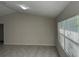 Spacious living room with vaulted ceilings and tile floors at 3817 Sw 161St Loop, Ocala, FL 34473