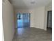 Living room with view of the pool and patio at 3817 Sw 161St Loop, Ocala, FL 34473