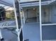 Screened patio with access to the pool area at 3817 Sw 161St Loop, Ocala, FL 34473