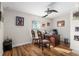 Home office with wood desk, two chairs, and hardwood floors at 5005 Sw 106Th St, Ocala, FL 34476
