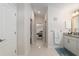 Bathroom hallway with access to bedroom and another bathroom at 5005 Sw 106Th St, Ocala, FL 34476